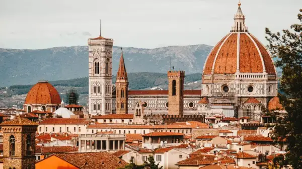 Florence skyline with Duomo, Giotto's Campanile, and terracotta rooftops.
